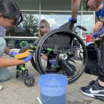 Annual Wheelchair Wash and Tuneup Provides Free Services and Priceless Connections