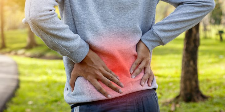 Runner suffering low back pain