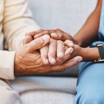 Nurse, hands and senior patient in empathy, safety and support of help, trust and healthcare consulting. Nursing home, counseling and gratitude for medical caregiver, client and hope in consultation