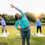 Senior sport people exercising during yoga workout class outdoor at park city – Fitness joyful Elderly lifestyle