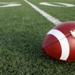 Close-Up Of American Football On Field